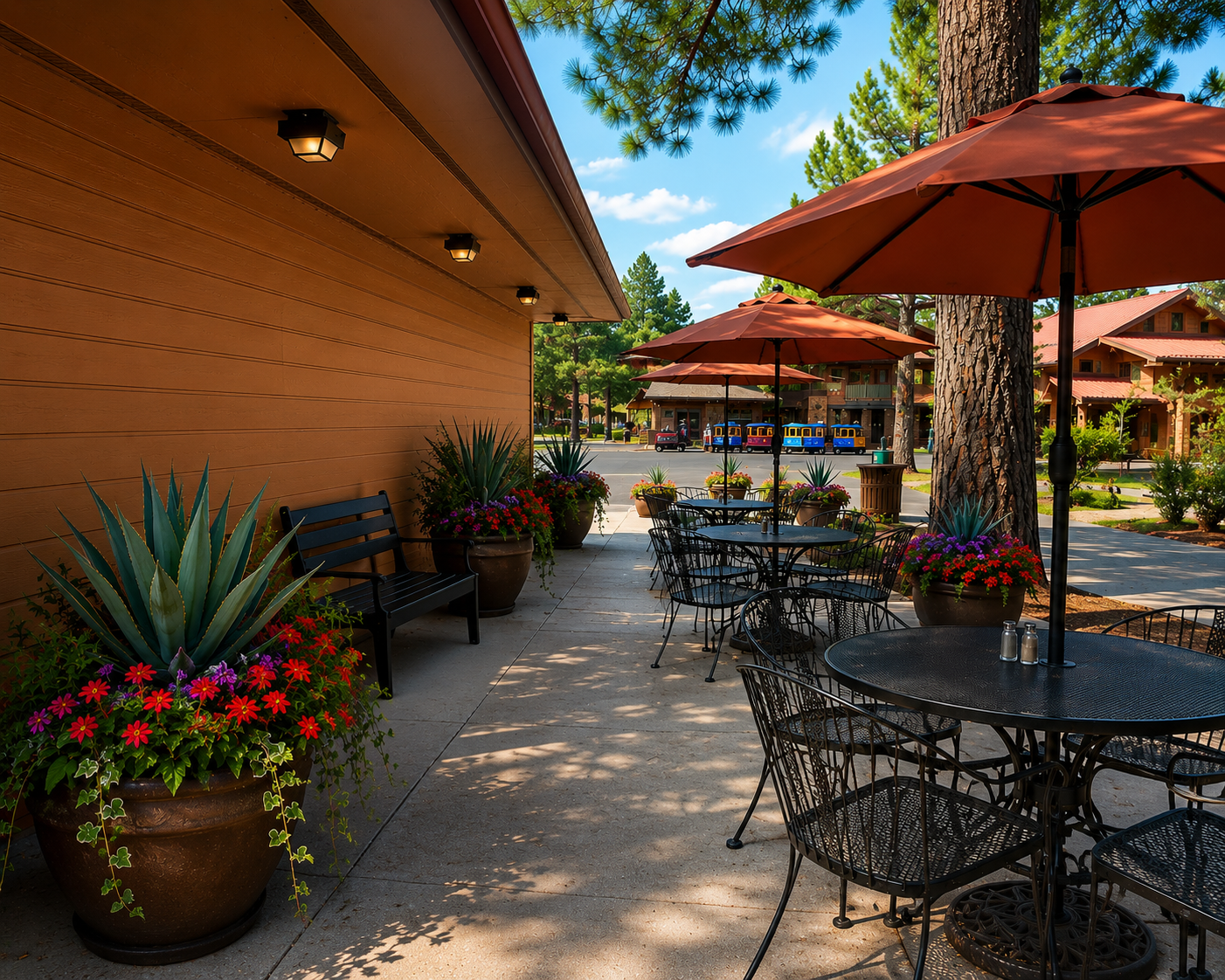 The Jimador patio in Sunriver — agave plants, flowers, and shaded tables beneath the pines